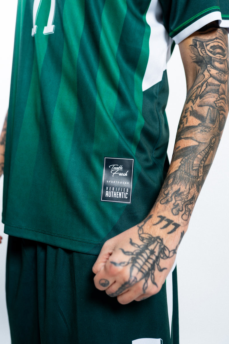 Uniforme Premium con insignia texturizada 3D en primer plano